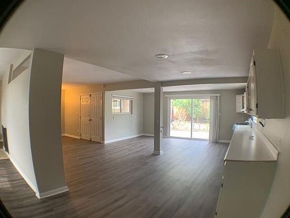 Kitchen nook and partial family room view