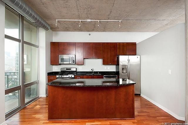 Kitchen with large island, comfortably seats 4.