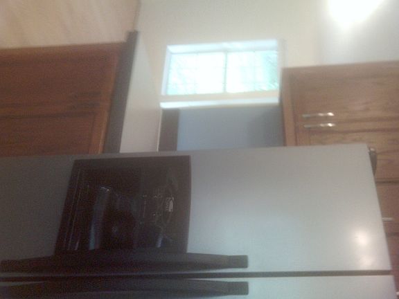 Refrigerator and cabinets
