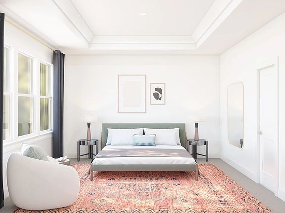 Primary suite with crown moulding and private bath