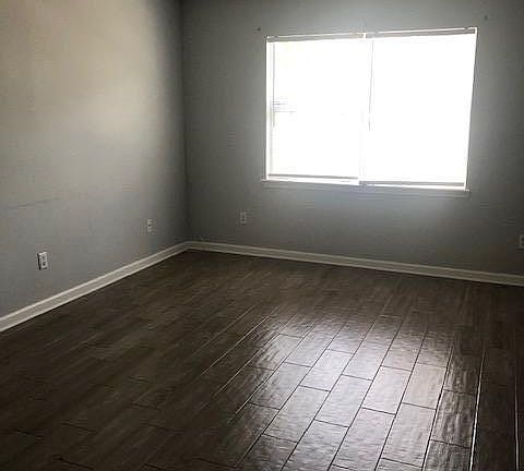 Living room with "wood look" tile floors