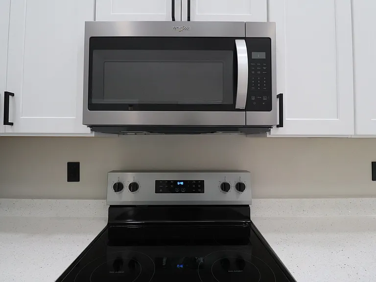 Brand new kitchen appliances never used, including stainless steel microwave and oven. Home is move-in ready with all appliances brand new.