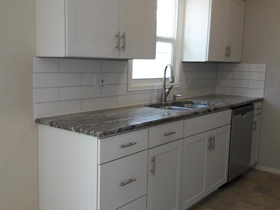 New cabinets, granite, tile