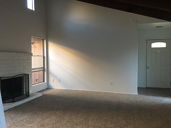 Living Room with Freplace and Vaulted Ceiling