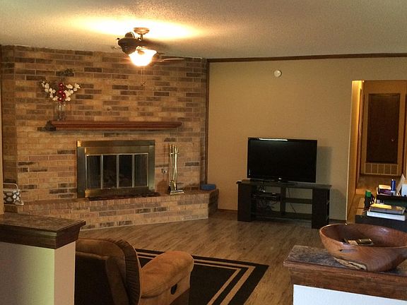 Comfortable living room. With gas burning logs in the fireplace.