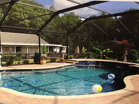 View of pool and spa