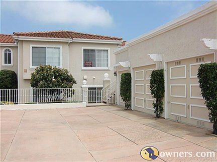 Outside view of 2-car garage & condo.