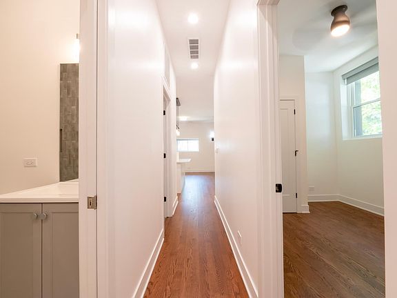 hallway with view of 2nd bath and 2nd bedroom