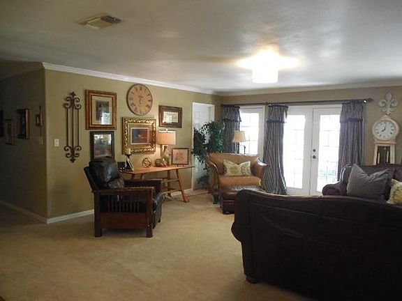 AS YOU ENTER HOME NOTICE THE FRENCH DOORS