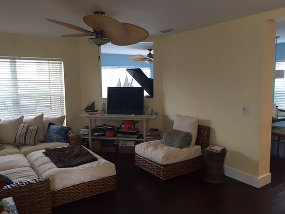 family room, open floor plan, hardwood floors