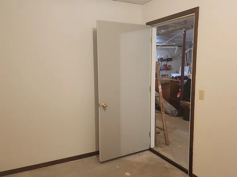 Locked storage room in cellar
