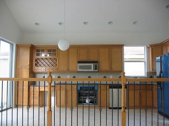 Kitchen area w/granite counter and Stainless Steel Appliance