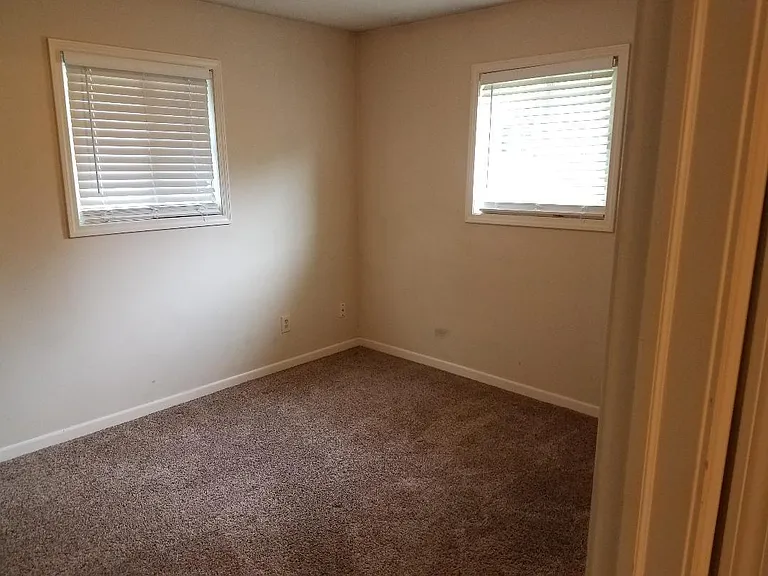 Carpet has been replaced with new laminate flooring in bedroom #2