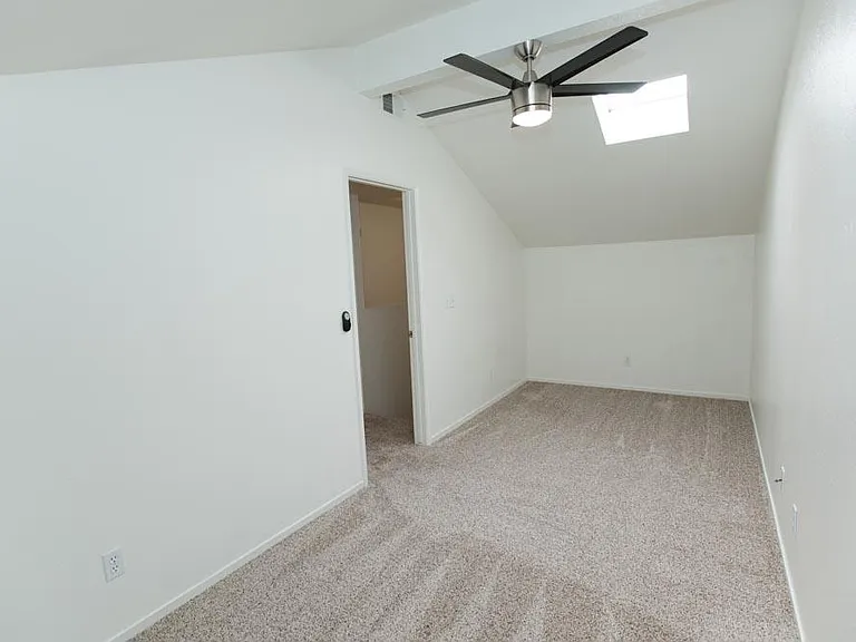 Greatroom. Ceiling fan.Two sky lights