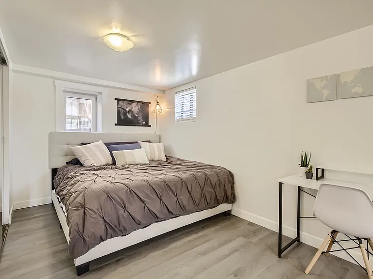 Sleeping area - this is a king size bed shown, with room for a nightstand. The double door closet is nearly 7 feet long with double hanging racks and shelving.