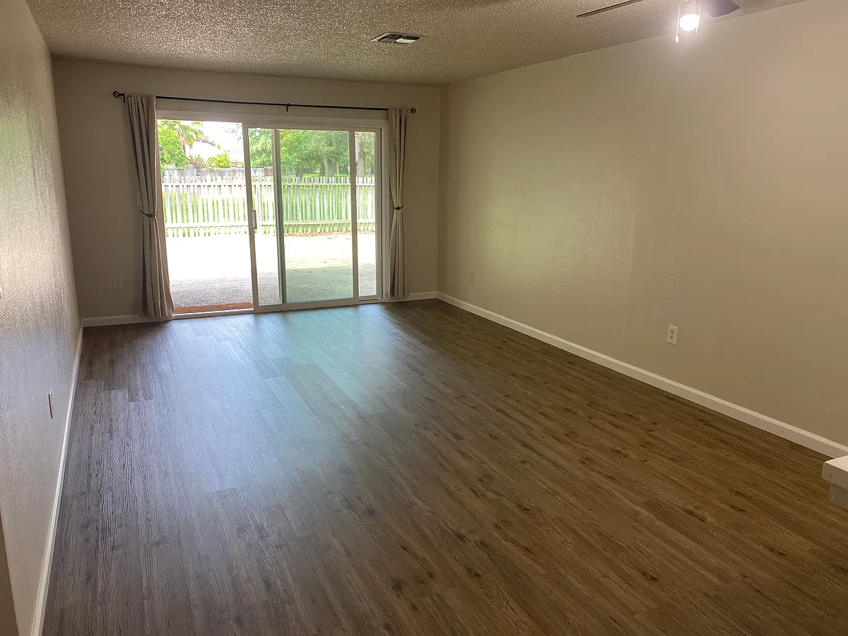 New flooring throughout the house and newly painted living room - 859 Pebble Way