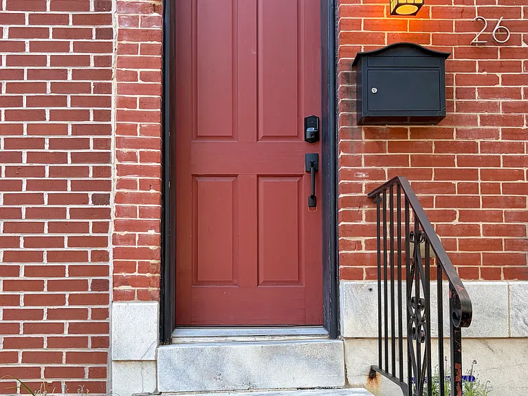 Entrance with key-less smart lock.