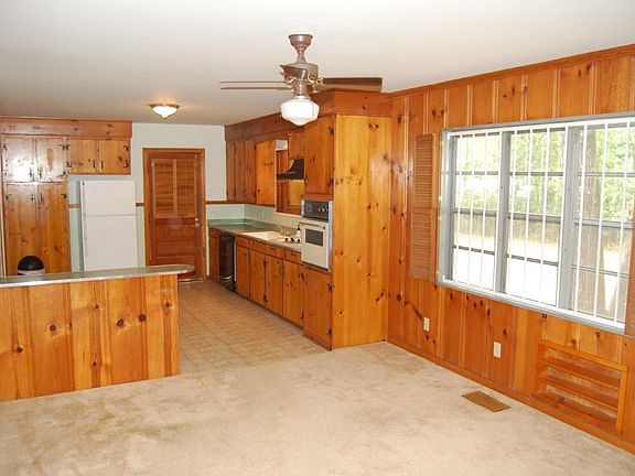 den looking to kitchen