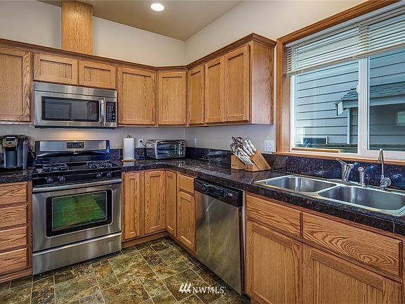 4th image of 9356 11th Street NE #20