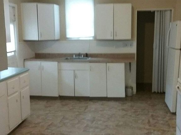 Large kitchen, washer and dryer hook up here