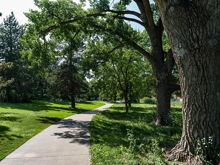 Leafy paths and peaceful mornings at Harvard Gulch Park_just minutes from Modera University Park.