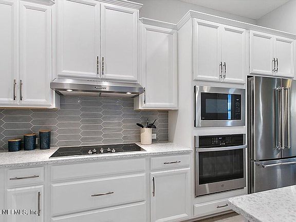 4th image of 11313 BARRIER BEACH Place