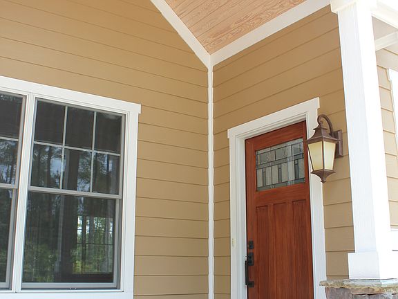 Stone entrance/wood ceiling