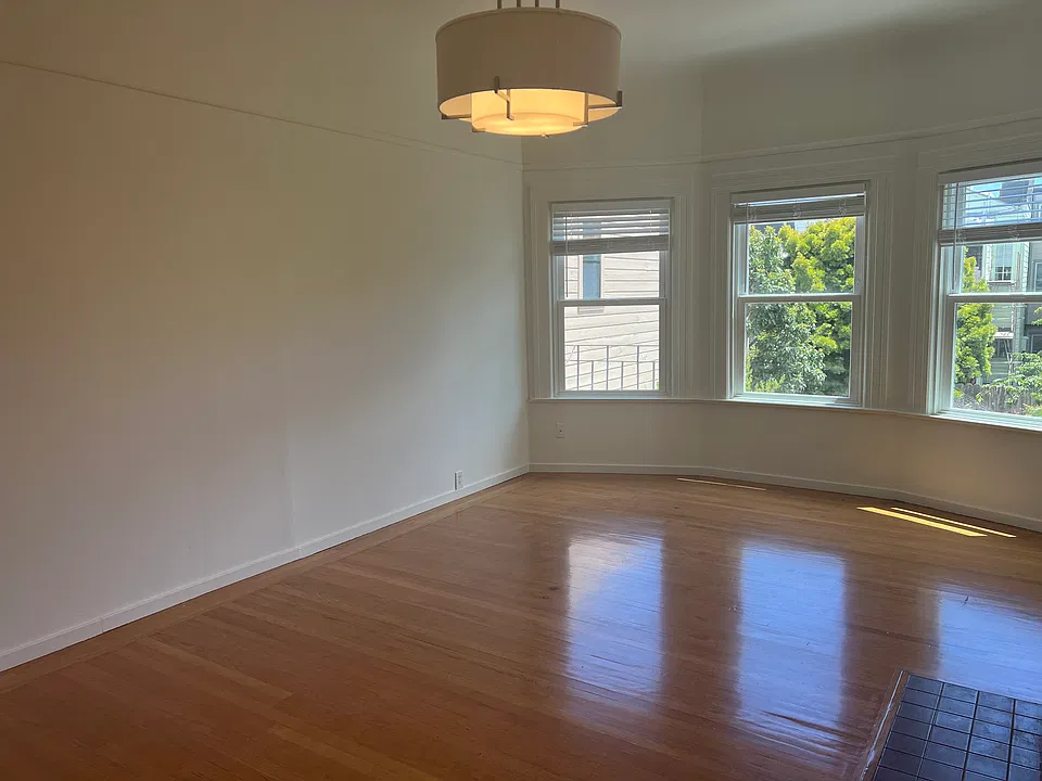 Large living room overlooking rear yard