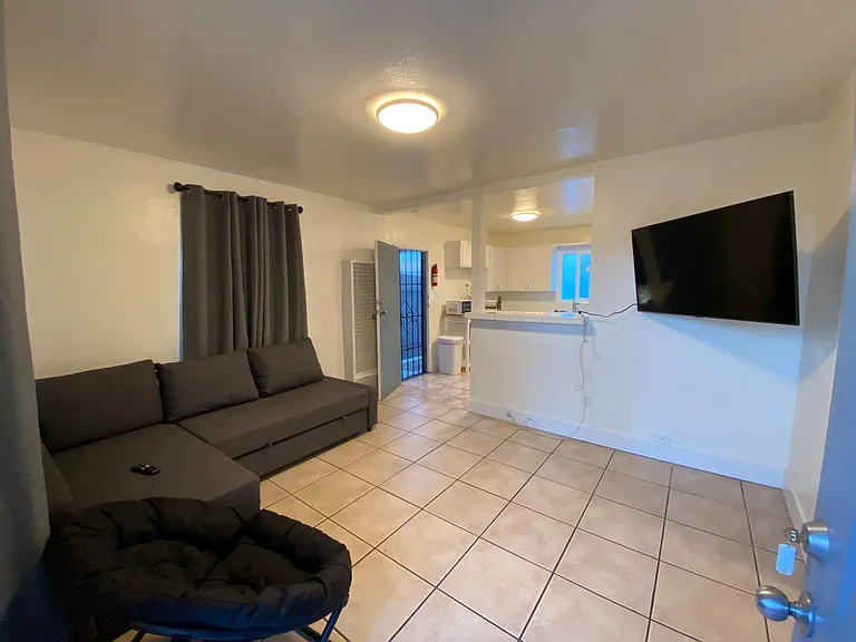 2 Bedroom: Living area with wall mounted Smart TV
