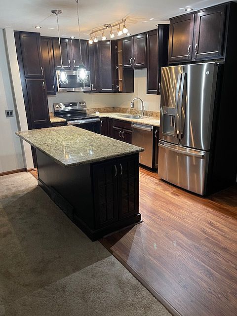 Kitchen, all brand new flooring and appliances, GE stainless steel