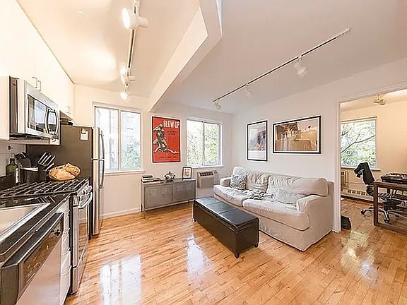 5th image of 319 E 8th St APT 3C