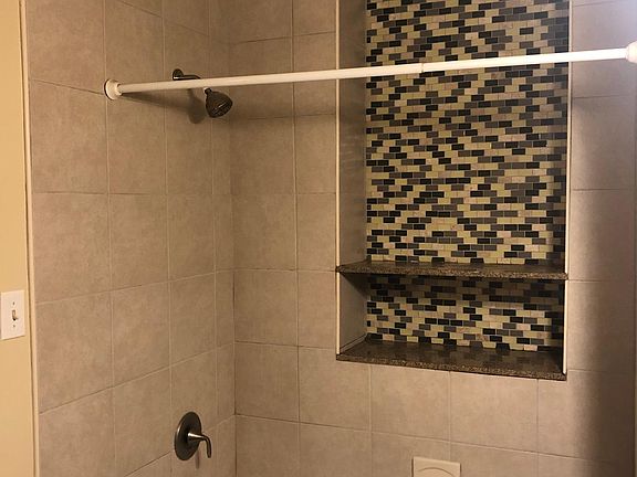 Bathroom with linen closet.