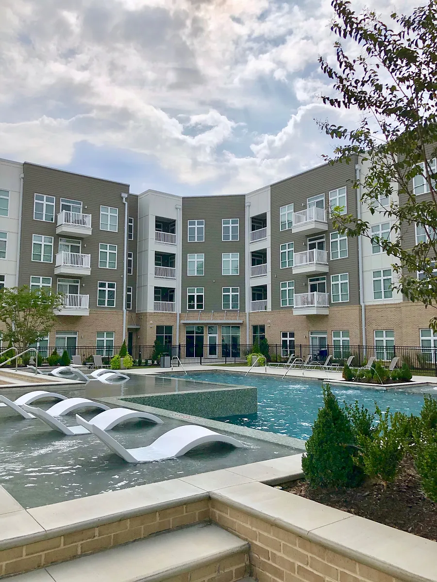 Pool with tanning ledge - Lofts at Zebulon