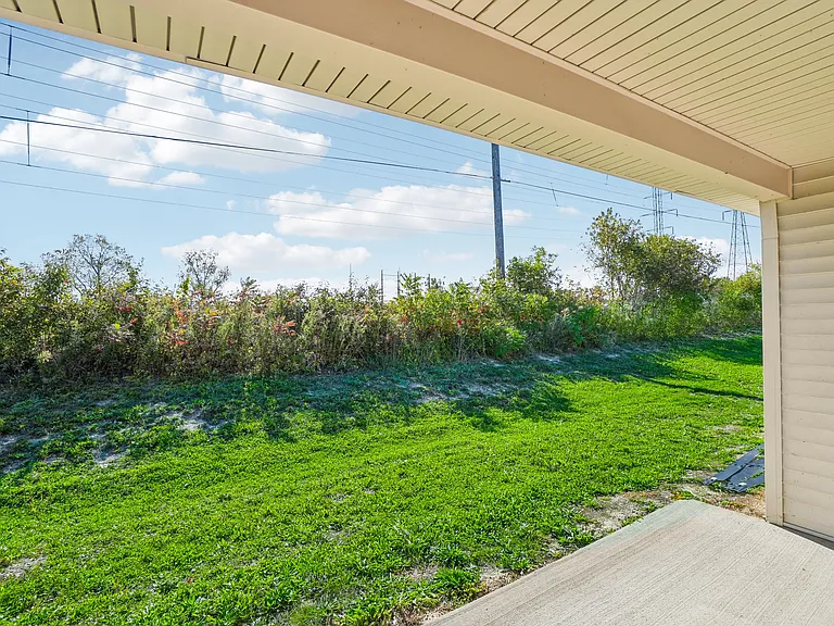 covered rear porch and private view