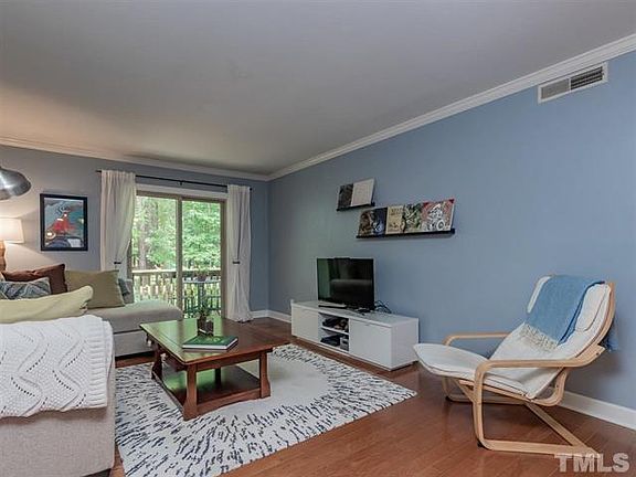 Hardwood floors in living room - view of Pritchard Park from deck.*