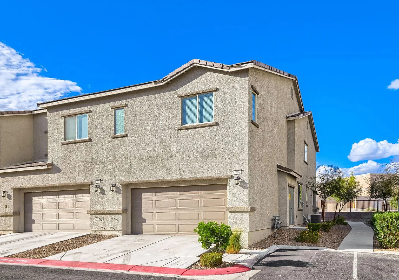 Gated 4-Bedroom Townhouse with Pool & Community Parks — Photo 1