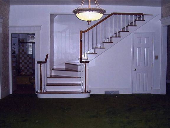 Dinning Area, Bathroom Entrance and Stairway to Two Bedroo