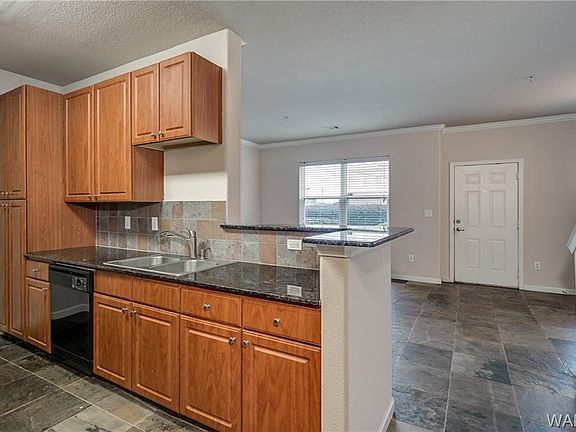 5th image of 600 13th St E APT 215