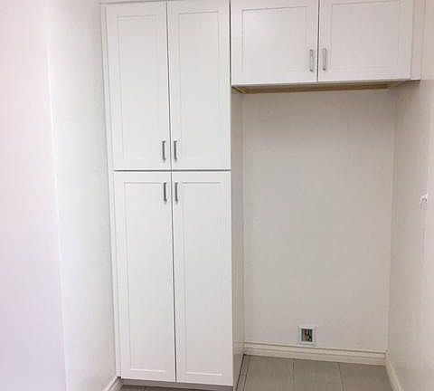 Kitchen cabinet and refrigerator area