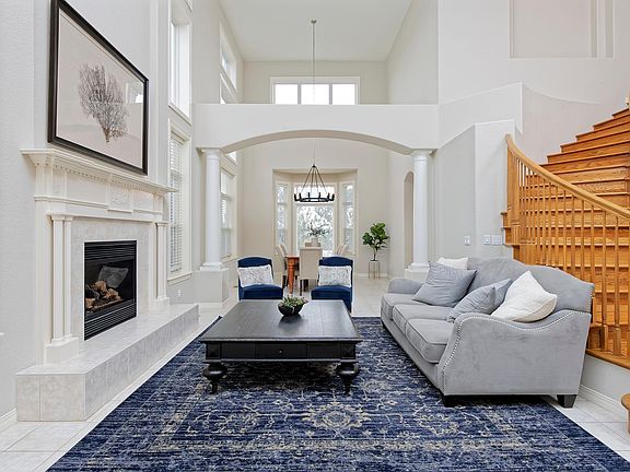 Formal living space with fireplace.