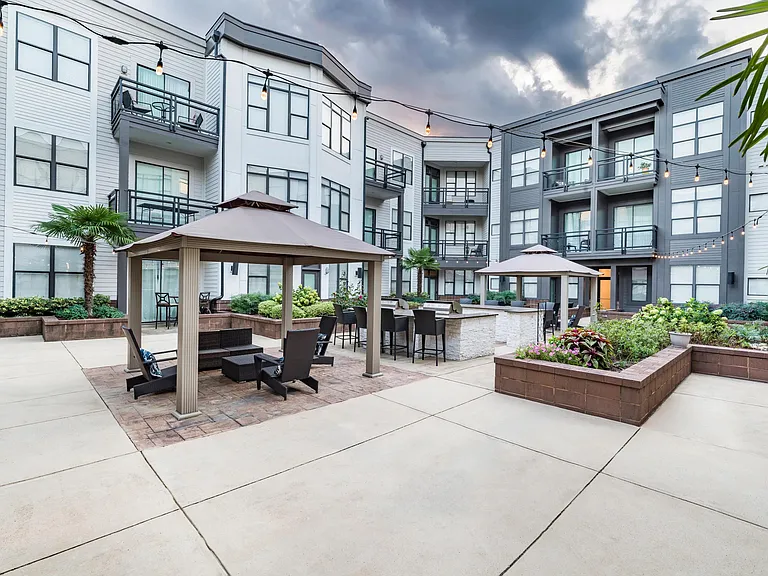 Enjoy an evening outdoors with social seating and BBQ grills.