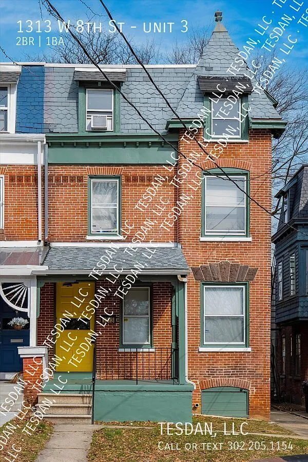 Building Photo - 1313 W 8th St #3
