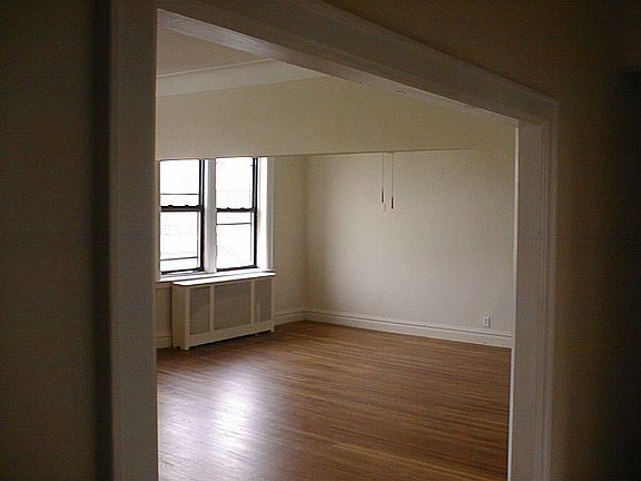 VIEW INTO THE LARGE LIVING ROOM/DINING ROOM
