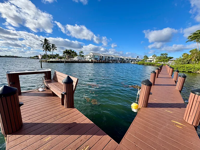 View from community boardwalk/dock and fishing area looking into canal