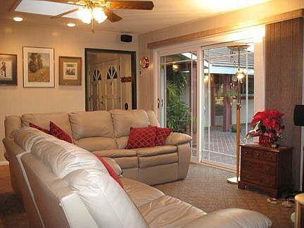 Family room opens onto courtyard-perfect for entertaining