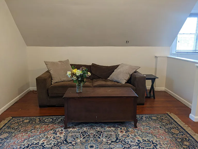 Third floor living space couch area