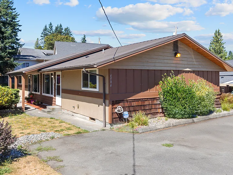 Front view of home/duplex. The home for rent is the front unit closest to parking.