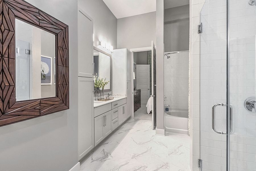 Luxurious bathrooms with walk-in showers and soaking tubs