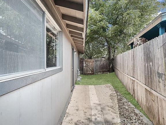 Side yard with patio, connected to the living room