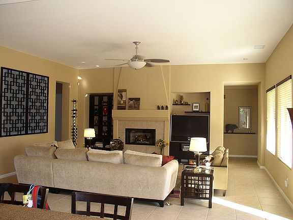 Greatroom is centrally located to the kitchen, covered patio and five bedrooms